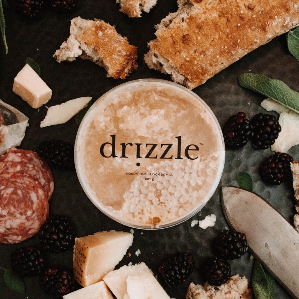 Drizzle Honeycomb in the middle of a luxurious charcuterie board.